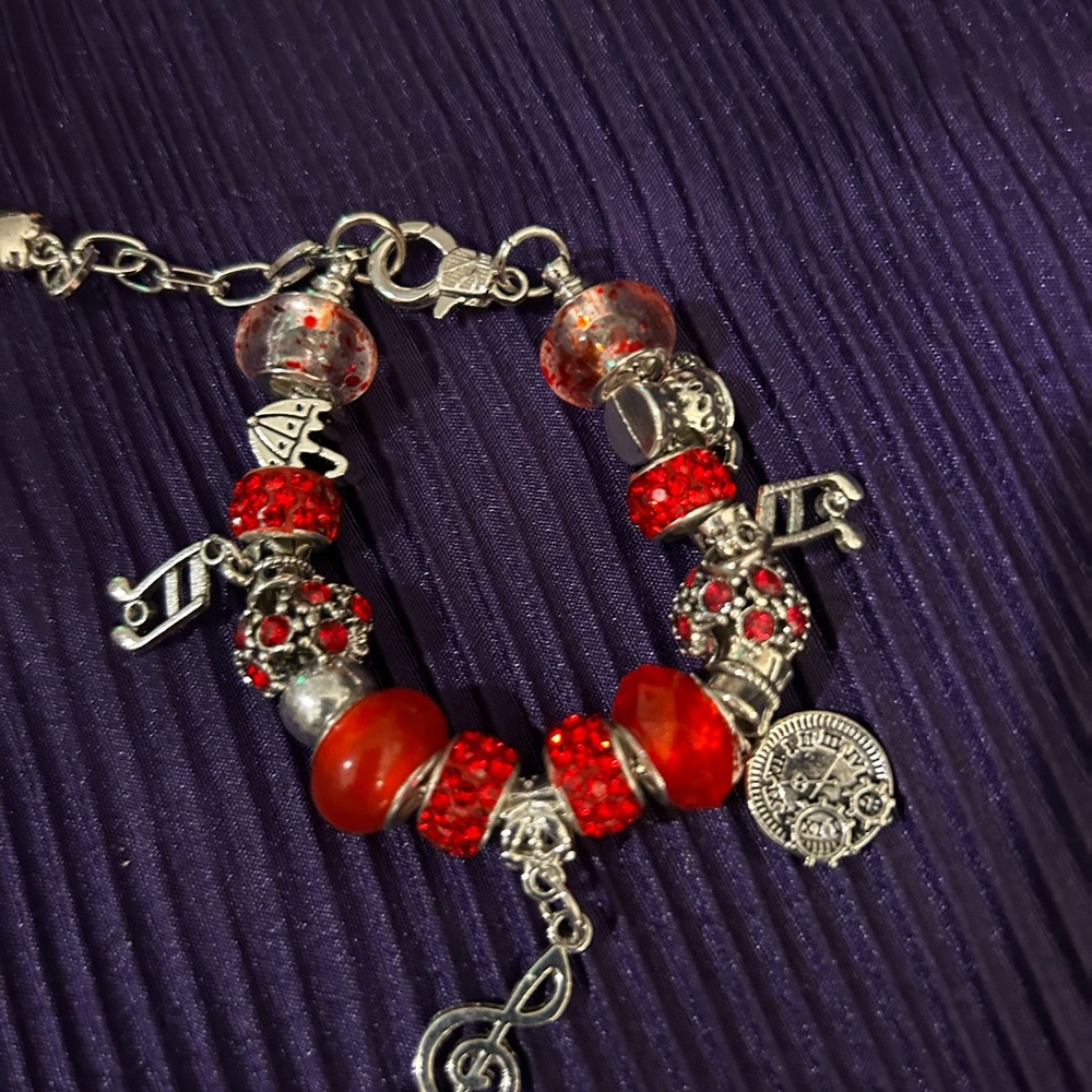 Elegant Red and Silver Charm Bracelet